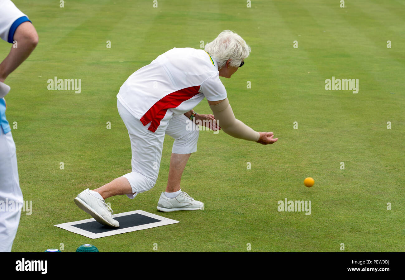 A player bowling the jack at the national women`s lawn bowls championships, Leamington Spa, UK Stock Photo